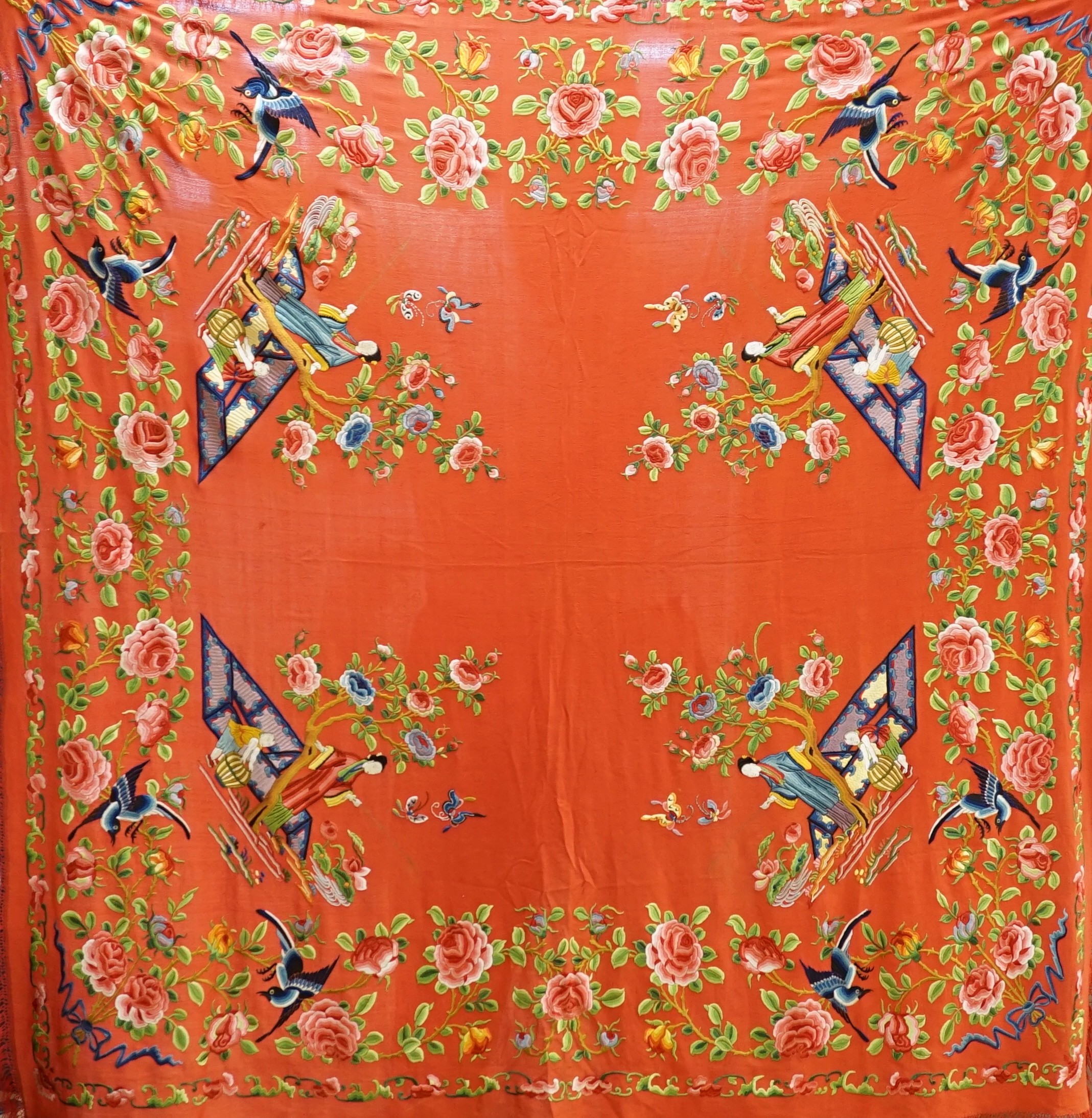 A Chinese early 20th century silk crepe, polychrome embroidered shawl